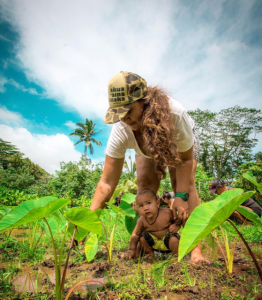 Mother and child in taro patch
