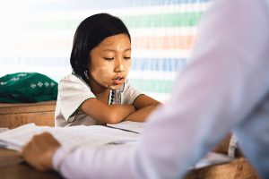 Student reading schoolwork